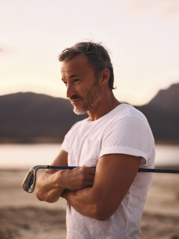 Golfare vid solnedgång